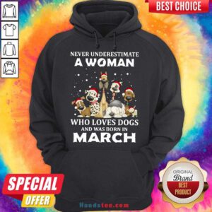 Never Underestimate A Woman Who Loves Dogs And Was Born In March Christmas Hoodie- Design By Handstee.com