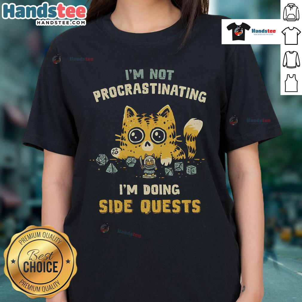 Funny cat ladies tee featuring 'I'm Not Procrastinating, I'm Doing Side Quests' design for gamers and cat lovers.