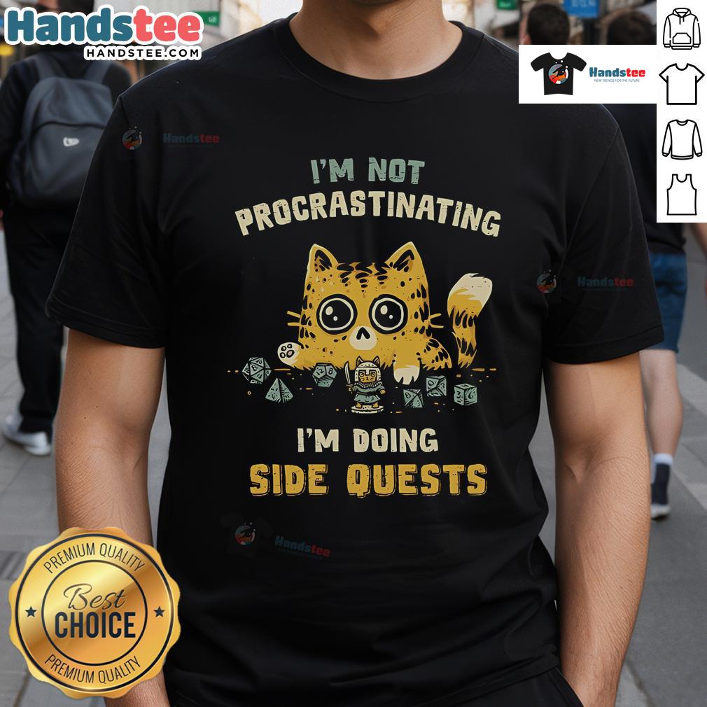 Alt Text: I'M Not Procrastinating I'M Doing Side Quests Cat T-Shirt with a playful cat graphic and bold text design.