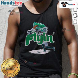 Saquon Barkley performing a reverse hurdle in an Awesome Fly Eagles tank top, showcasing his 2024 athletic performance.