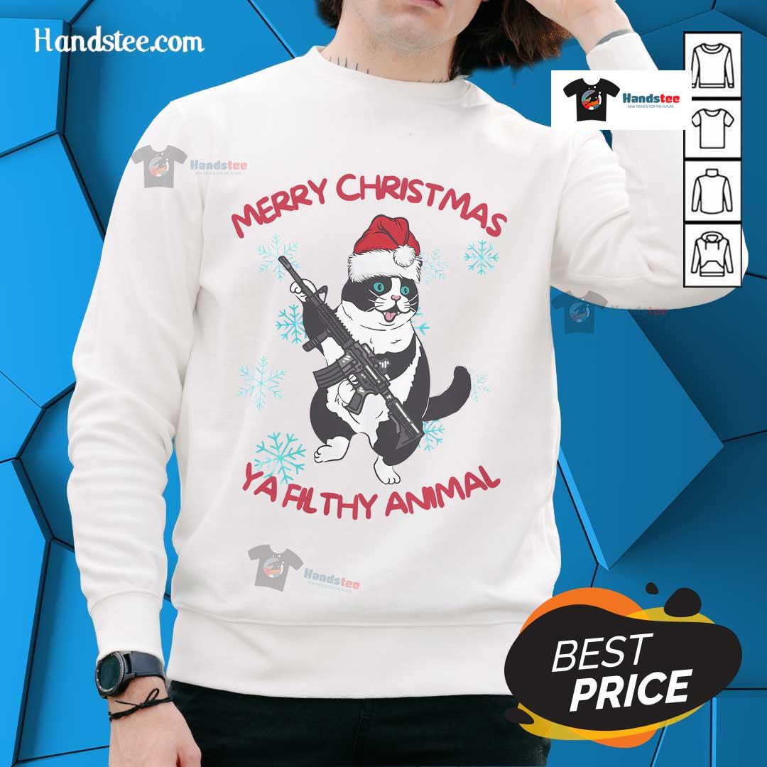 Funny cat in a Christmas sweatshirt saying 'Merry Christmas Ya Filthy Animal' for a festive holiday vibe.