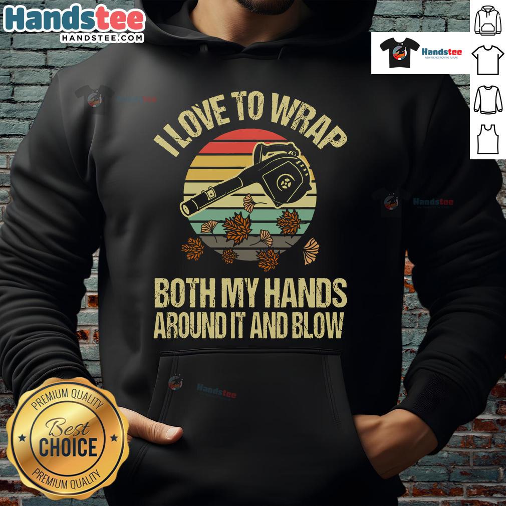 Funny vintage sunset hoodie featuring a person joyfully using a leaf blower with both hands wrapped around it.