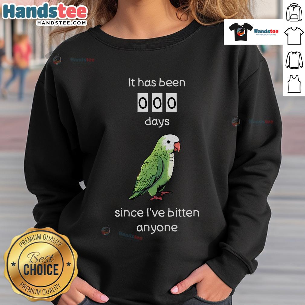 Funny Quaker parrot biting a sweatshirt, showcasing a playful design perfect for bird lovers and quirky fashion enthusiasts.