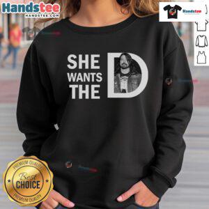 Alt Text: Dave Grohl wearing 'She Wants The D' sweatshirt, showcasing a casual and fun music-inspired fashion style.