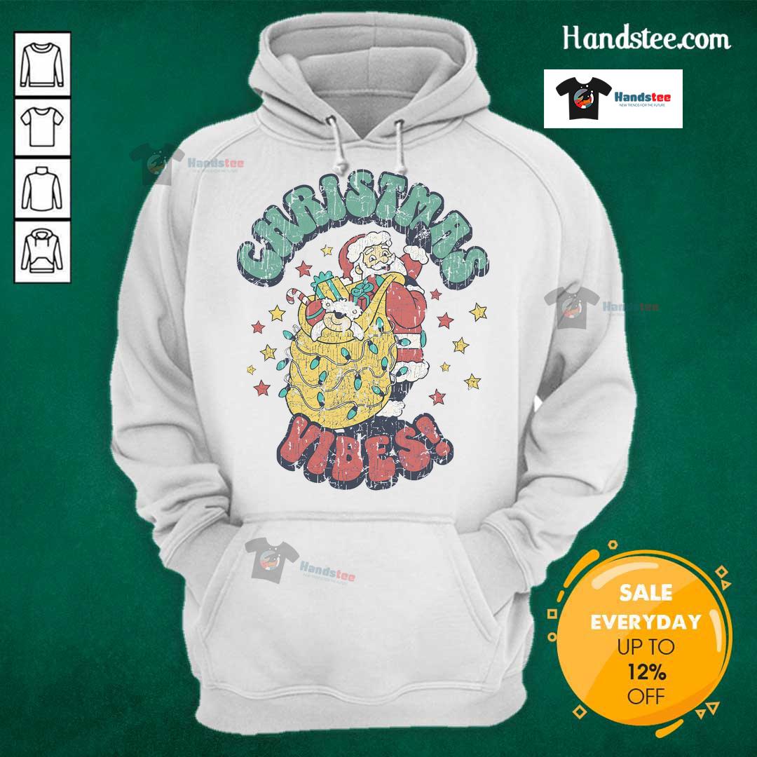 Vintage Santa Claus cartoon design on a cozy Christmas hoodie, perfect for festive holiday wear.