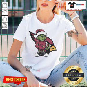 Official Grinch Hug Ball Arizona Cardinals Christmas ladies tee featuring festive design and vibrant team colors.