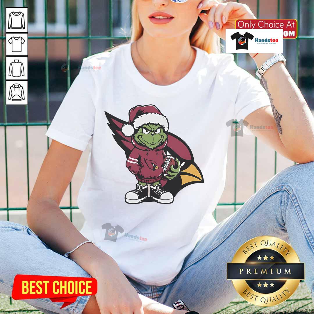 Official Grinch Hug Ball Arizona Cardinals Christmas ladies tee featuring festive design and vibrant team colors.