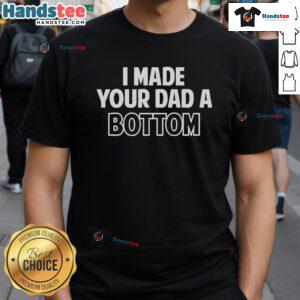 Alt Text: Official I Made Your Dad A Bottom T-Shirt featuring bold text on a stylish black tee for humorous dad-themed gifts.