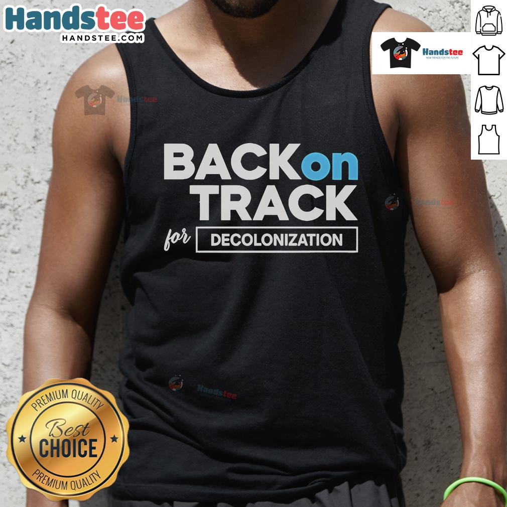 Alt Text: Isaac Ssemakadde wearing a 'Back On Track For Decolonization' tank top, promoting social justice and cultural awareness.