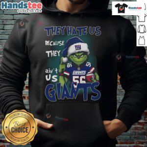 Premium Grinch hoodie featuring 'They Hate Us Because They Ain't Us' design for New York Giants fans.