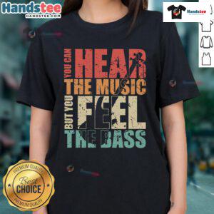 Vintage ladies tee featuring 'You Can Hear The Music But You Feel The Bass' design, perfect for music lovers and fashion enthusiasts.