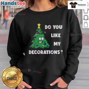 Cozy sweatshirt with 'Do You Like My Decorations?' text, surrounded by a beautifully decorated Christmas tree and lights.