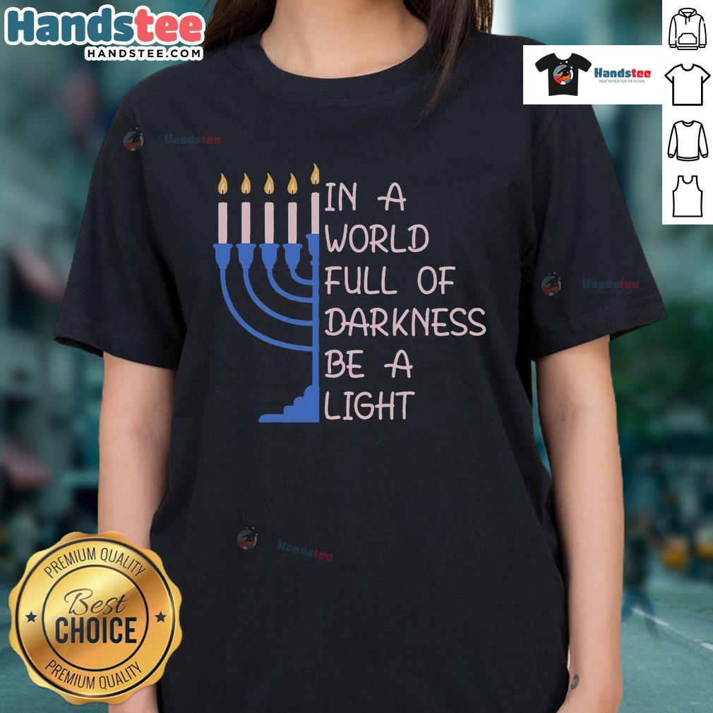 Good Hanukkah Menorah glowing brightly, symbolizing hope and light in a world of darkness on a ladies tee.