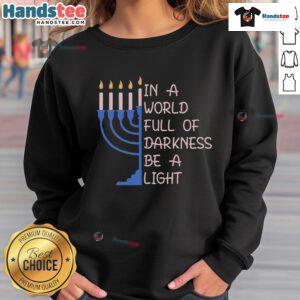 Good Hanukkah Menorah in a world full of darkness, Be a Light sweatshirt featuring a festive design and vibrant colors.