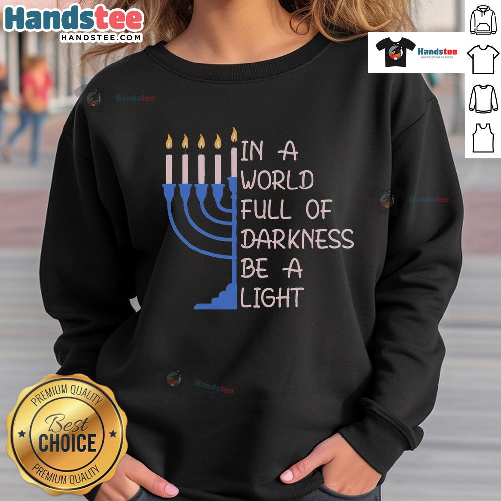 Good Hanukkah Menorah in a world full of darkness, Be a Light sweatshirt featuring a festive design and vibrant colors.
