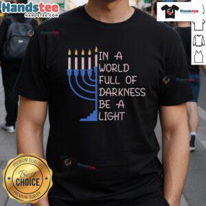 Good Hanukkah Menorah design on a T-shirt: 'In A World Full Of Darkness Be A Light' celebrating the festival of lights.