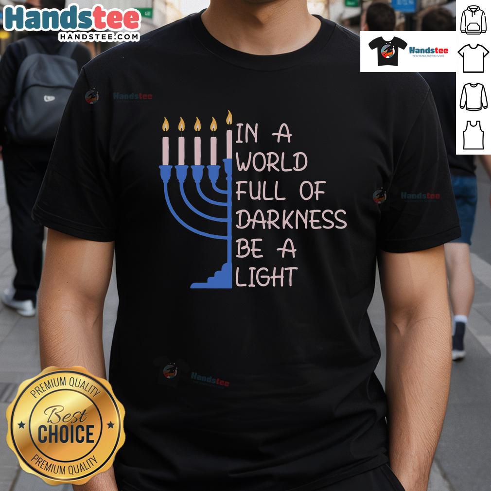 Good Hanukkah Menorah design on a T-shirt: 'In A World Full Of Darkness Be A Light' celebrating the festival of lights.