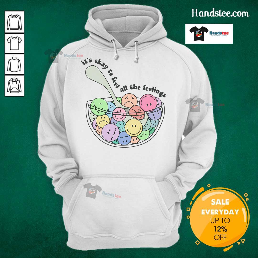 Good It's Okay To Feel All The Feelings Hoodie displayed on a hanger, featuring a cozy design and uplifting message.