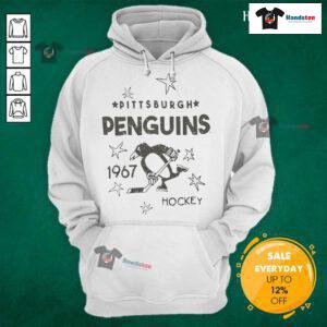 Vintage Pittsburgh Penguins logo hoodie from 1967, featuring iconic black and gold colors, perfect for hockey fans.