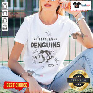 Alt Text: Vintage Pittsburgh Penguins logo from 1967 on a ladies' tee, perfect for hockey fans and stylish sportswear.