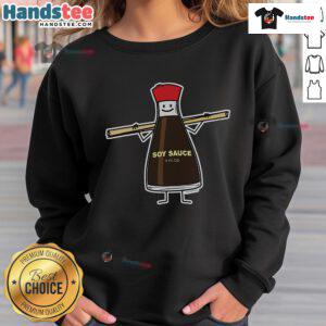 Good soy sauce bottle next to Asian chopsticks on a stylish sweatshirt, perfect for foodie enthusiasts.