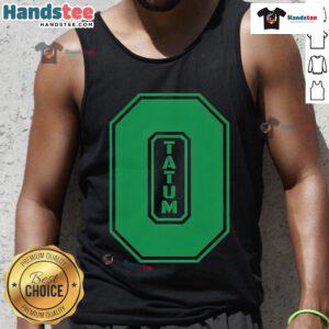 Alt Text: Good Tatum wearing number 0 in a vibrant green tank top, showcasing incredible style and charisma on the court.