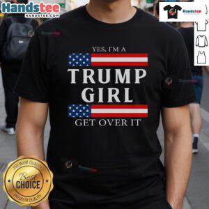 Girl wearing a patriotic USA flag t-shirt supporting Trump, showcasing pride in American values during election season.