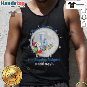 Santa Snoopy wishes Merry Christmas to all, featuring Los Angeles Dodgers theme in 2023 tank top design.