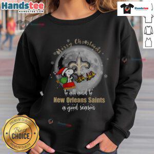 Santa Snoopy Merry Christmas sweatshirt featuring New Orleans Saints logo for a festive holiday season.