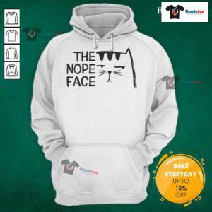 Funny cat with an unamused expression wearing a 'Nope' face hoodie, perfect for cat lovers and humor enthusiasts.