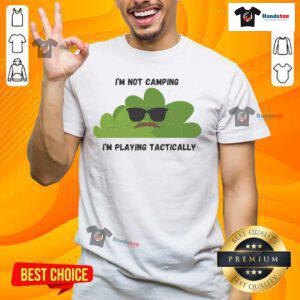 Alt Text: Funny I'M Not Camping I'M Playing Tactically Cool Bush T-Shirt design with playful graphics and bold text.