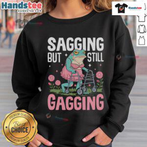 Funny sagging but still gagging frog meme sweatshirt featuring a colorful frog design perfect for casual wear.