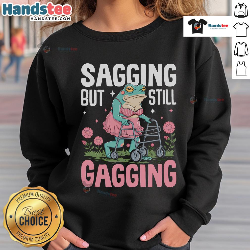 Funny sagging but still gagging frog meme sweatshirt featuring a colorful frog design perfect for casual wear.