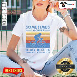 Alt Text: Vintage ladies tee featuring a humorous quote about wondering if your bike thinks about you too. Perfect for bike lovers!