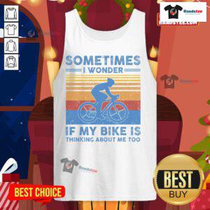 Funny vintage tank top with 'Sometimes I Wonder If My Bike Is Thinking About Me Too' design, perfect for bike lovers.