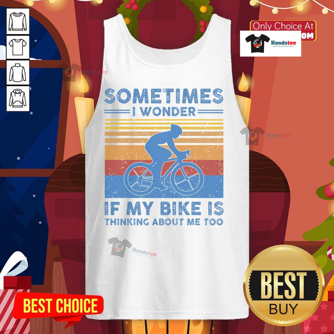 Funny vintage tank top with 'Sometimes I Wonder If My Bike Is Thinking About Me Too' design, perfect for bike lovers.