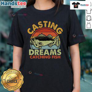 Retro sunset scene featuring a woman casting a fishing line, showcasing the 'Good Casting Dreams' ladies tee design.