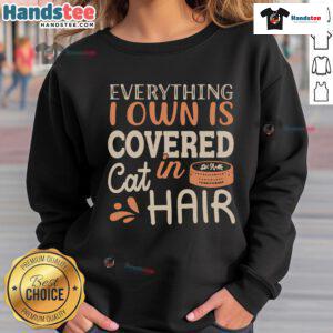 Cozy 'Good Everything I Own Is Covered In Cat Hair' sweatshirt featuring a playful cat graphic, perfect for cat lovers.
