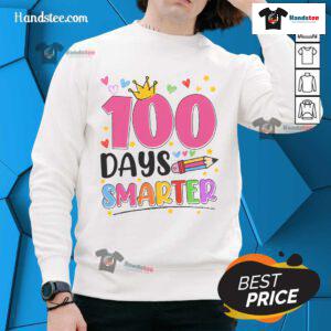 Kid wearing a '100 Days Smarter' sweatshirt celebrating the 100th day of school with a big smile.