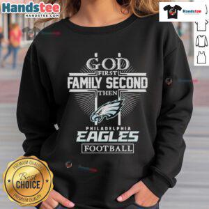 Nice God First Family Second Philadelphia Eagles football sweatshirt in navy blue with bold graphics and relaxed fit.