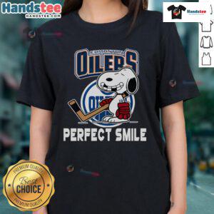 Detroit Red Wings Snoopy tee from The Peanuts Movie featuring Snoopy's perfect smile, perfect for hockey fans.