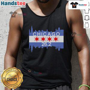 Runner in a Chicago flag tank top crossing the finish line at the 26.2-mile marathon, showcasing athletic spirit.