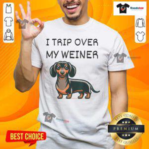 Funny tripping over my Weiner Dachshund T-shirt featuring a playful Doxie illustration, perfect for dog lovers.
