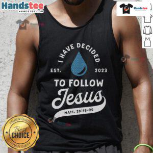 Christian wearing a 'Good Have Decided to Follow Jesus' tank top during baptism in 2023, celebrating faith and devotion.