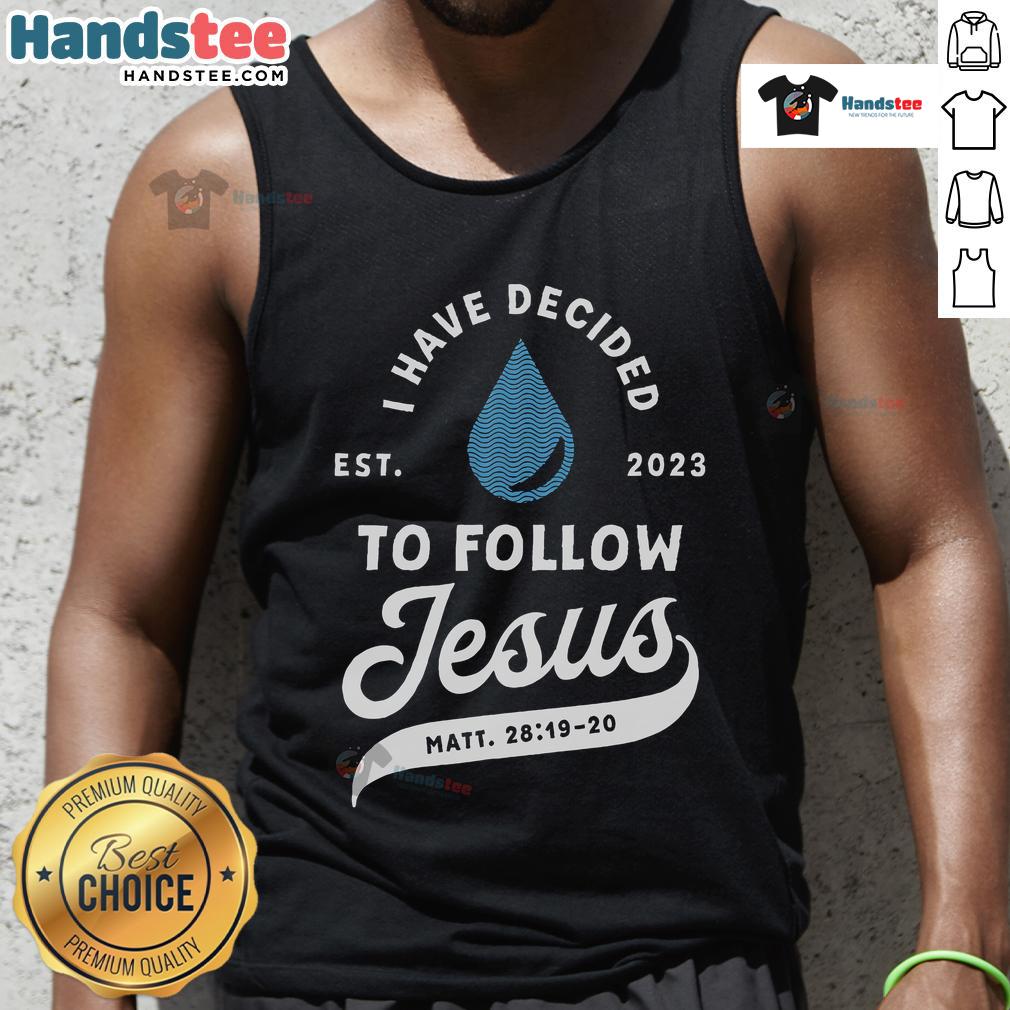 Christian wearing a 'Good Have Decided to Follow Jesus' tank top during baptism in 2023, celebrating faith and devotion.