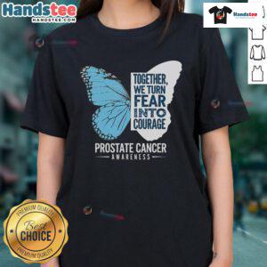 Alt Text: Light blue ribbon on a ladies' tee promoting Good Prostate Awareness, transforming fear into courage.