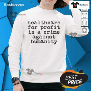 Hot anti-capitalist healthcare for profit is a crime sweatshirt displayed on a model, promoting social justice and health equity.