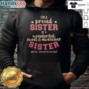 Proud sister wearing a 'Nice I'm A Proud Sister' hoodie, showcasing love for her wonderful sister in a cozy setting.
