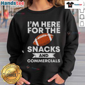Cozy America Football sweatshirt with 'I'm Here for the Snacks and Commercials' slogan, perfect for game day relaxation.