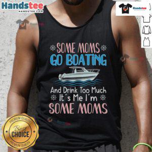 Nice mom boating in a tank top, confidently steering a pontoon boat as captain, enjoying a sunny day on the water.
